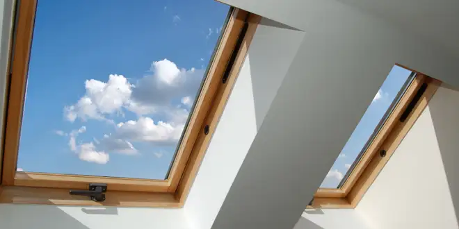 Gutter system diverting rainwater away from a home