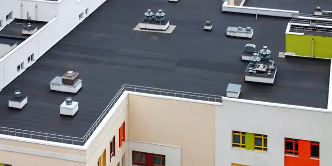 Large flat commercial roof membrane in Collingwood, Ontario