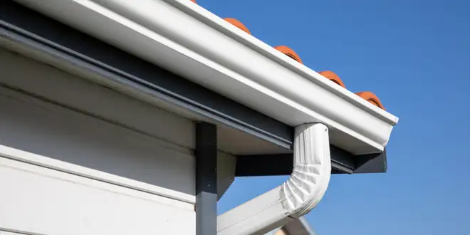Seamless eavestrough system running along the roofline of a Collingwood, Ontario home