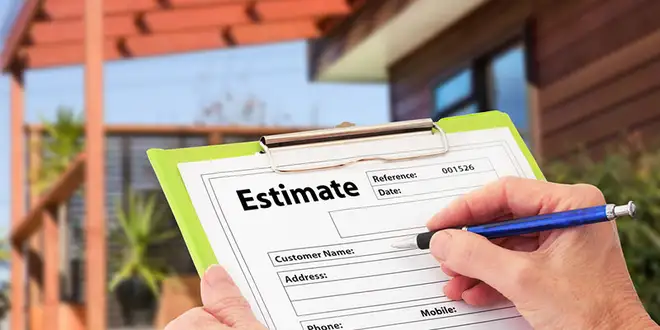 Roofing contractor reviewing project details with a homeowner